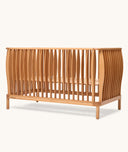 Product shot of the ergoPouch ellska Skye Crib, a promise of safety and serenity.