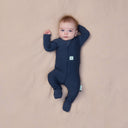 Newborn in ergoPouch Long Sleeve Romper 1.0 TOG Ink