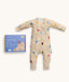 Packaging of the ergoPouch Long Sleeve Romper 1.0 TOG Birthday Blobs