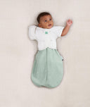 Baby wearing an ergoPouch Butterfly Cardi Natural with one arm out