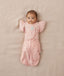 Newborn wearing ergoPouch Butterfly Cardi Daisies