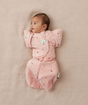 Newborn wearing ergoPouch Butterfly Cardi Daisies
