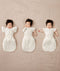 Newborns being swaddled in ergoPouch Cocoon Swaddle Sack 1.0 TOG Oatmeal Marle with Butterfly Cardi Oatmeal Marle for arms up sleeping, transitioning to arms out