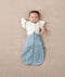 Baby wearing an ergoPouch Butterfly Cardi Oatmeal Marle with one arm out