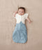 Baby sleeping with arms out in a ergoPouch Newborn Spring Sleep Style Bundles