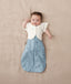 Baby sleeping with arms out in a ergoPouch Newborn Spring Sleep Style Bundles