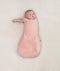 Newborn wearing ergoPouch Cocoon Swaddle Sack 0.2 TOG Berries, transitioning to arms out sleeping