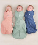 Three babies being swaddled in ergoPouch Cocoon Swaddle Sack 0.2 TOG Berries, Sage, and Night Sky