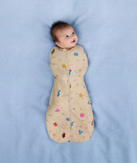 Newborn swaddled in an ergoPouch Cocoon Swaddle Sack 1.0 TOG Birthday Blobs