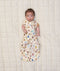 Newborn baby wearing ergoPouch Cocoon Swaddle Sack 0.2 TOG in Bon Appetit with both arms out
