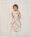 Newborn wearing ergoPouch Cocoon Swaddle Sack 1.0 TOG in Bon Appetit with both arms out