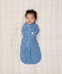 Newborn baby asleep wearing ergoPouch Cocoon Swaddle Sack 0.2 TOG in Petit Pretzel 