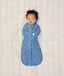 Newborn baby asleep wearing ergoPouch Cocoon Swaddle Sack 0.2 TOG in Petit Pretzel 