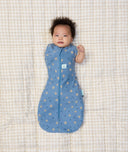 Newborn baby wearing ergoPouch Cocoon Swaddle Sack 0.2 TOG in Petit Pretzel with one arm out