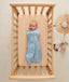 Newborn swaddled in ergoPouch Cocoon Swaddle Sack 1.0 TOG Dragonflies