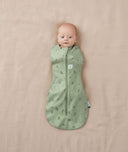 Newborn wearing an ergoPouch Cocoon Swaddle Sack 1.0 TOG Willow
