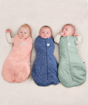 Babies being swaddled in ergoPouch Cocoon Swaddle Sack in Sage, Night Sky and Berries