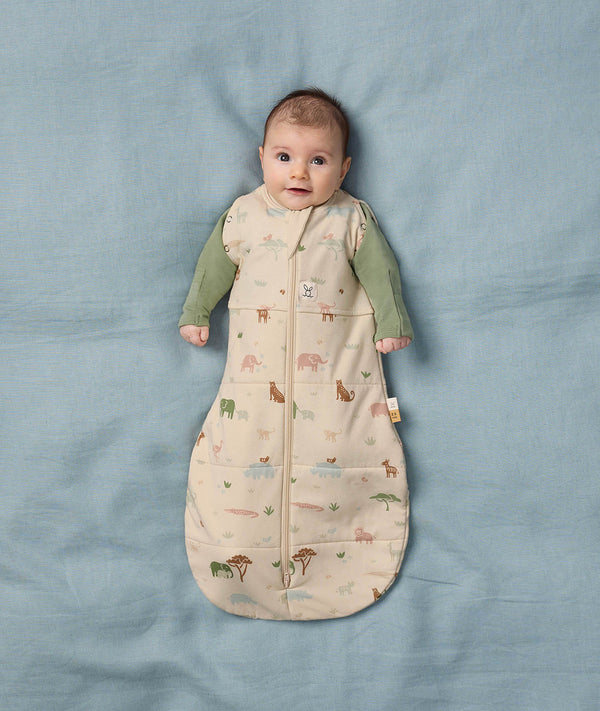 Baby in ergoPouch Cocoon Swaddle Sack 2.5 TOG with two arms out