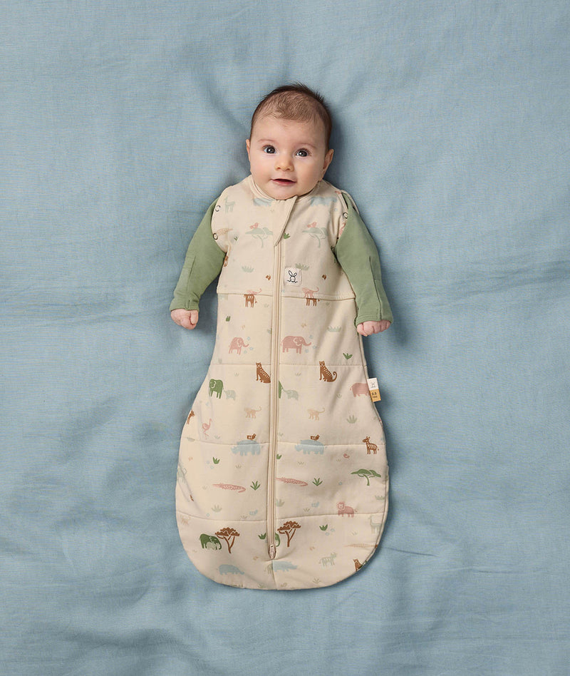 Baby in ergoPouch Cocoon Swaddle Sack 2.5 TOG with two arms out