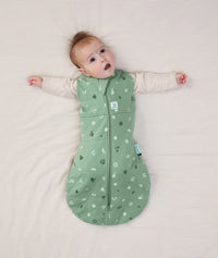 Baby sleeping with arms out in a ergoPouch Cocoon Swaddle Sack 2.5 TOG Sweet Orchard