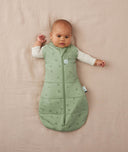 Baby sleeping with arms out in a ergoPouch Cocoon Swaddle Sack 2.5 TOG Willow