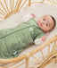 Baby sleeping with arms out in a ergoPouch Cocoon Swaddle Sack 2.5 TOG Willow