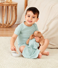 Toddler wearing ergoPouch Short Sleeve Pajamas in Sage