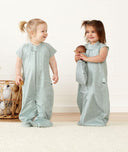 Toddlers laughing in ergoPouch Sleep Suit Sack in Sage