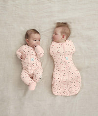 Newborns dressed in ergoPouch Cocoon Swaddle Sack 1.0 TOG Cute Fruit and Long Sleeve Romper Cute Fruit