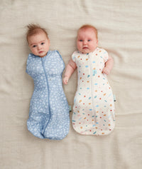 Newborn swaddled in ergoPouch Cocoon Swaddle Sack 1.0 TOG Desert Bloom