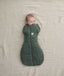 Baby wearing an ergoPouch Cocoon Swaddle Sack 2.5 TOG Veggie Patch