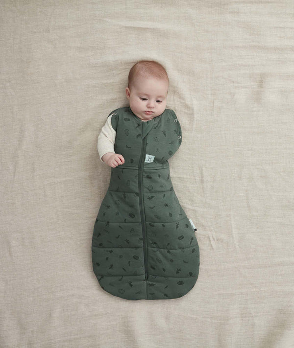Baby wearing an ergoPouch Cocoon Swaddle Sack 2.5 TOG with its one arm out