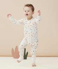 Child wearing  ergoPouch Long Sleeve Romper 0.2 TOG Desert Bloom