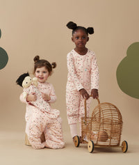 Two children standing in an ergoPouch Sleep Suit Sack 3.5 TOG Cute Fruit, a warm sleeping bag that converts to a sleeping bag with legs