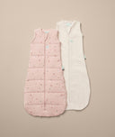Flatlay of ergoPouch Sleeping Sack 2.5 TOG Daisies and 1.0 TOG Oatmeal Marle, ideal for Spring