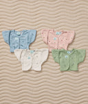 A group product shot featuring the Heritage ergoPouch collection for the ergoPouch Butterfly Cardi Dragonflies Dragonflies, Oatmeal Marle, Willow