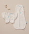 Flatlay of a newborn essential starter kit including ergoPouch Cocoon Swaddle Sack 1.0 TOG and Butterfly Cardi in heritage color Oatmeal Marle 
