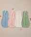 Flatlay of ergoPouch Summer Cocoon Swaddle Sack 0.2 TOG in Dragonflies, Daisies, Oatmeal Marle and Willow