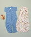 Flatlay of ergoPouch Jersey Sleep Suit Sack 0.2 TOG Bon Appetit and Sleep Suit Sack 1.0 TOG Petit Pretzel