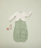 ergoPouch Arm Warmers Oatmeal Marle on top of Cocoon Swaddle Sack Willow