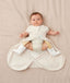 Baby wearing an ergoPouch Hip Harness Cocoon Swaddle Sack 1.0 TOG Oatmeal Marle with legs out