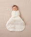 Newborn swaddled in ergoPouch Hip Harness Cocoon Swaddle Sack 2.5 TOG Oatmeal Marle