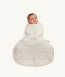 Newborn swaddled in ergoPouch Hip Harness Cocoon Swaddle Sack 2.5 TOG Oatmeal Marle