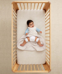 Baby with hip dysplasia in hip-harness-sleep-sack-3-5-tog-oatmeal-marle