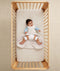 Baby with hip dysplasia in hip-harness-sleep-sack-3-5-tog-oatmeal-marle