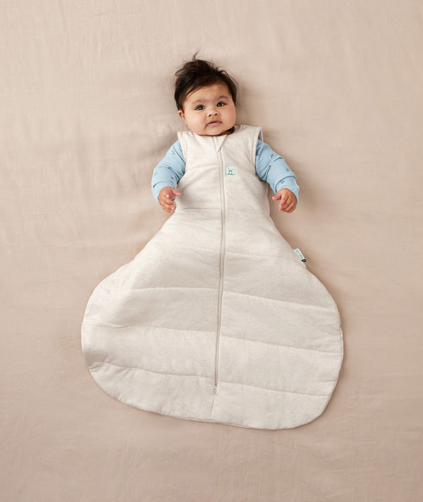 Baby with hip dysplasia in ergoPouch Hip Harness Sleep Sack 2.5 TOG Oatmeal Marle