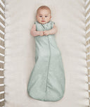 Infant wearing ergoPouch Sleep Sack in Sage