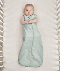 Infant wearing ergoPouch Sleep Sack in Sage