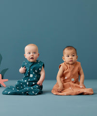 Two Infants wearing sleep-sack-0-2-tog-sunny and Honey Bees