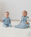 Infant wearing a sleep-sack-2-5-tog-dragonflies